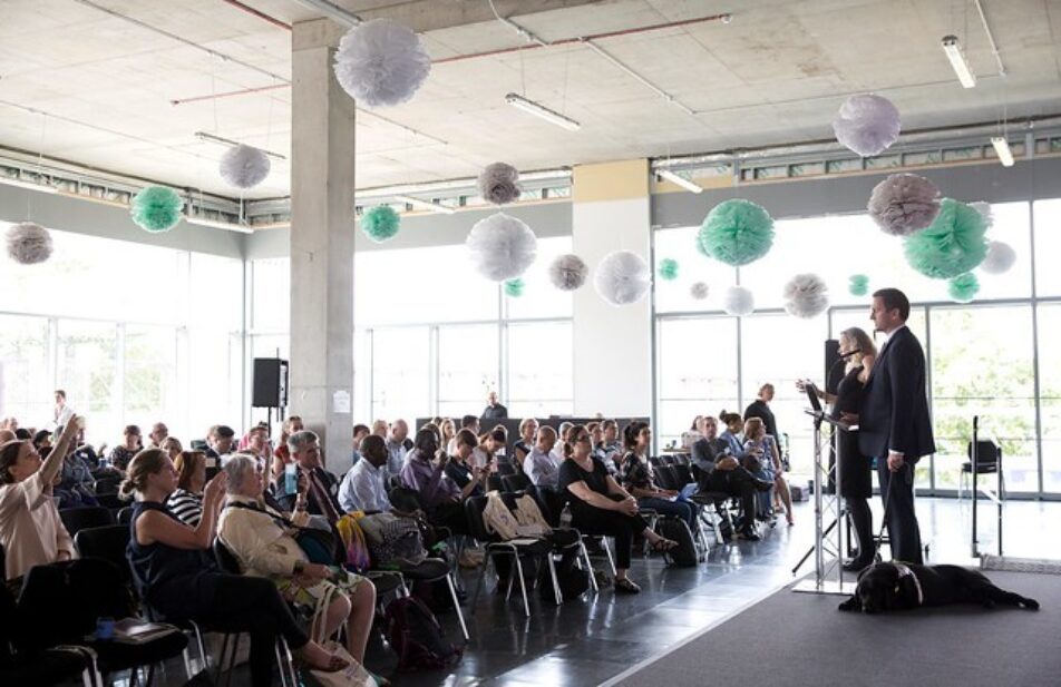 Speaker and audience at the Disability Innovation Summit