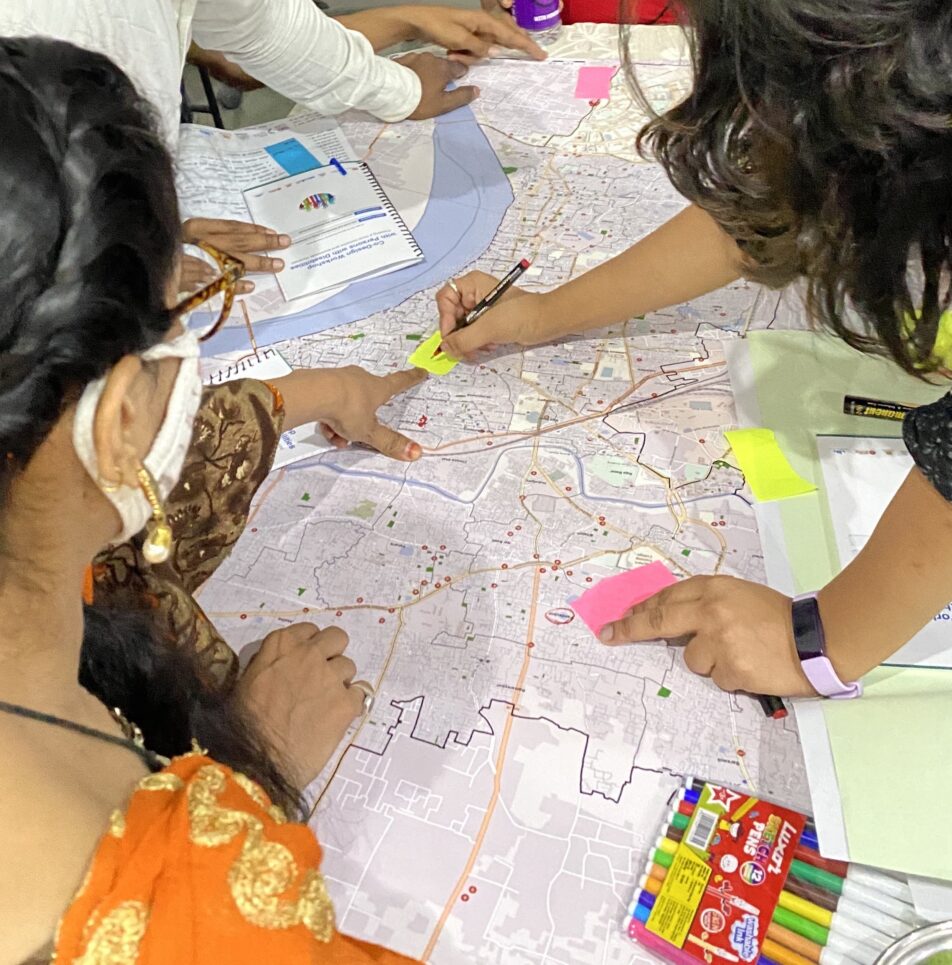 Participants collaborate to mark-up a map of Varanasi City