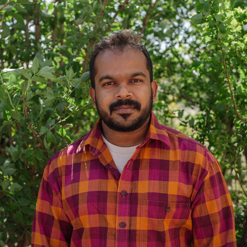 Bala smiling into the camera
