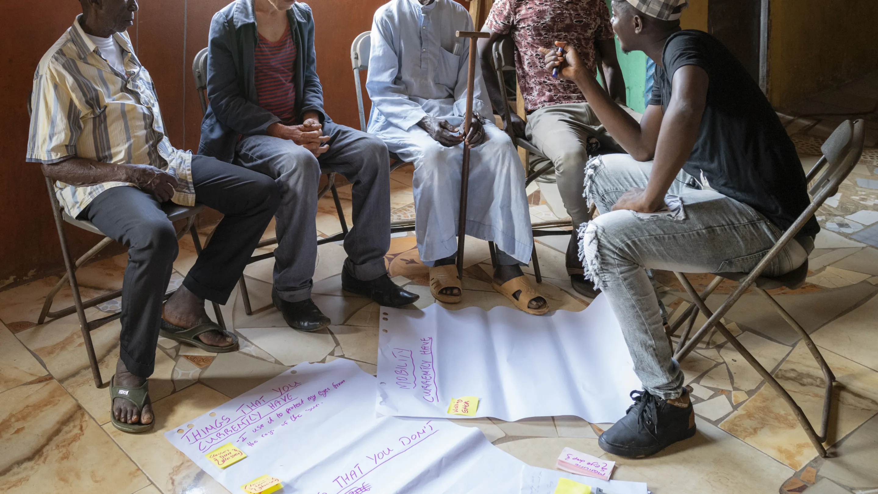Amadu leads group work with partially sighted participants