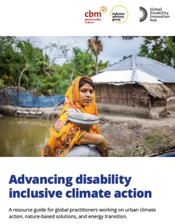 Person in a colorful garment stands near water with a rural house in the background; cover of the "Advancing Disability Inclusive Climate Action" guide featuring logos of CBM Global, IAG, and GDI Hub.